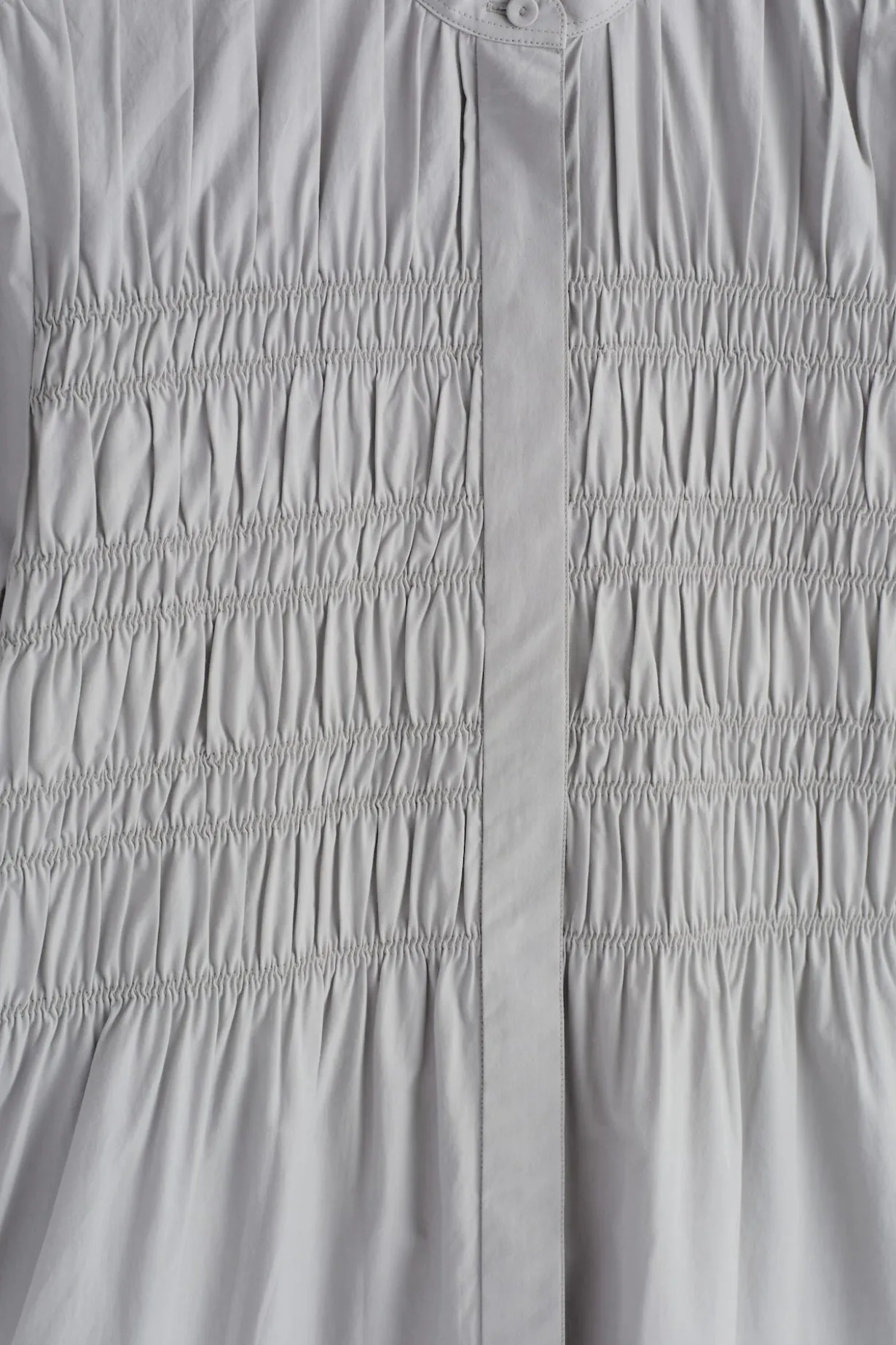 BLUSE AUS BAUMWOLLE MIT RAFFUNGEN