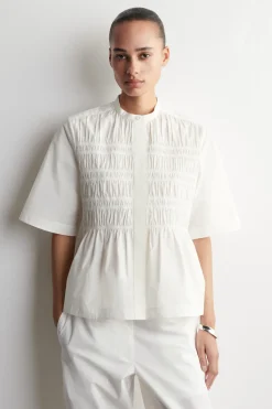 BLUSE AUS BAUMWOLLE MIT RAFFUNGEN