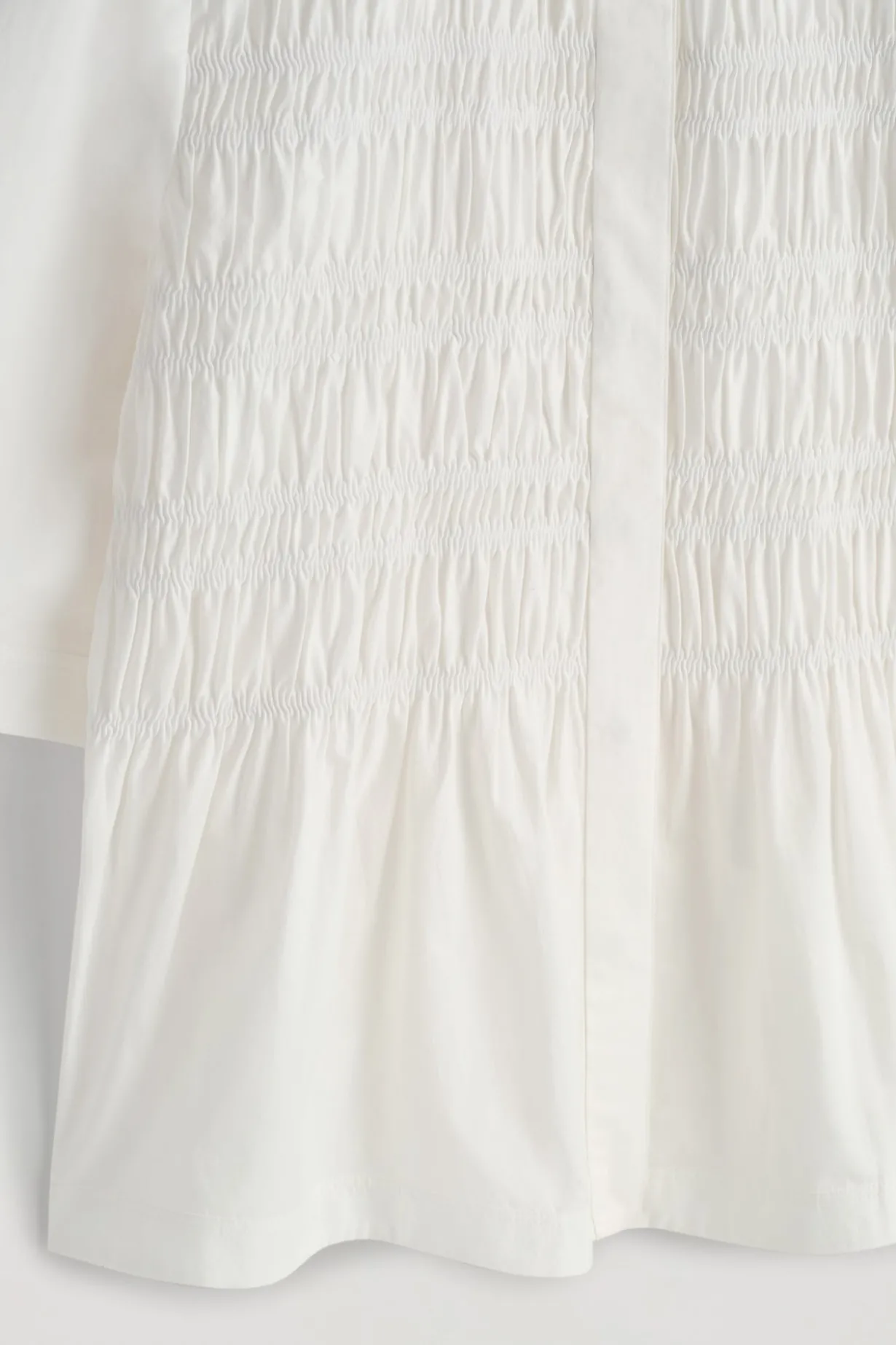 BLUSE AUS BAUMWOLLE MIT RAFFUNGEN