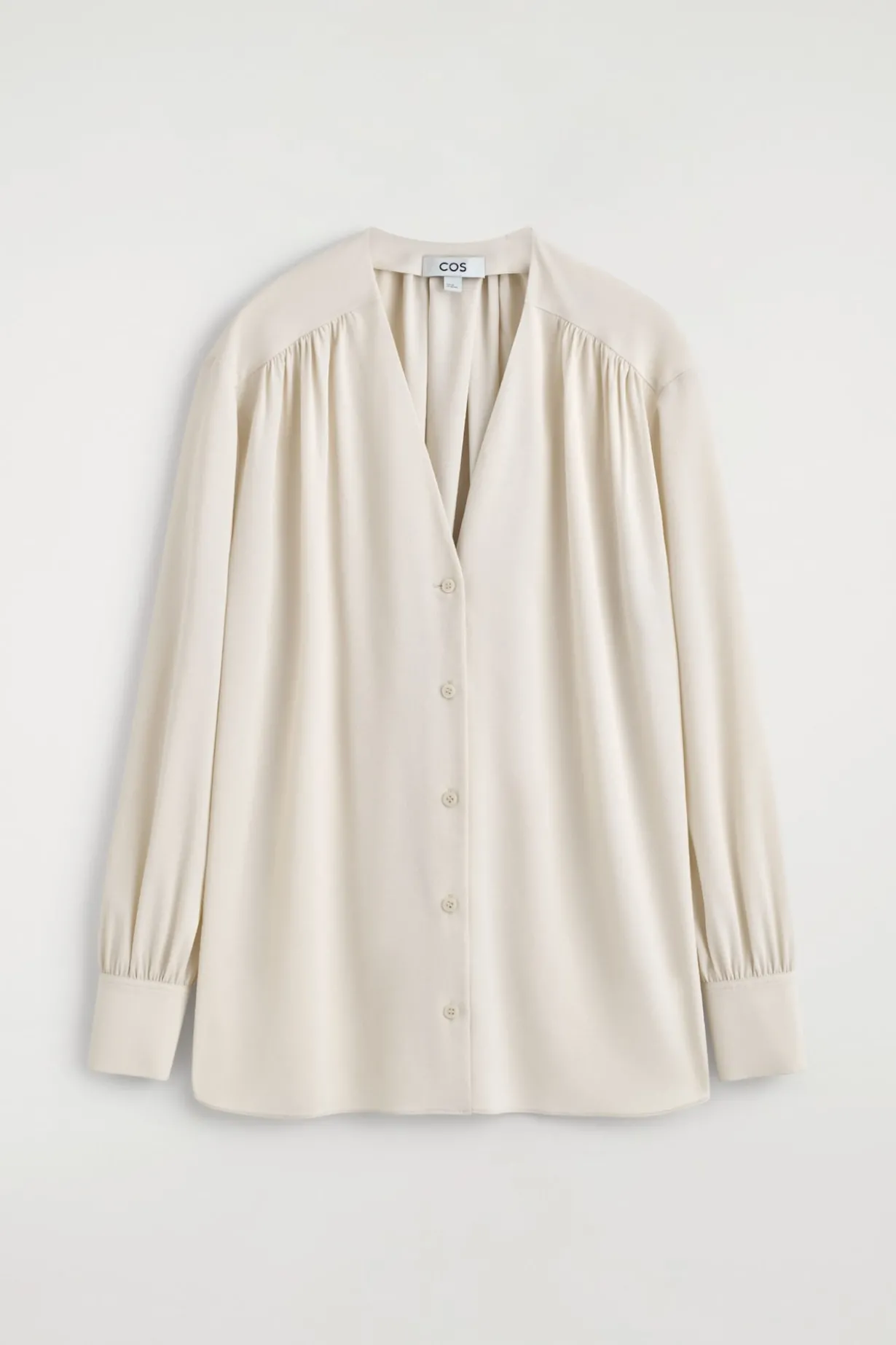 BLUSE MIT V-AUSSCHNITT UND RAFFUNGEN