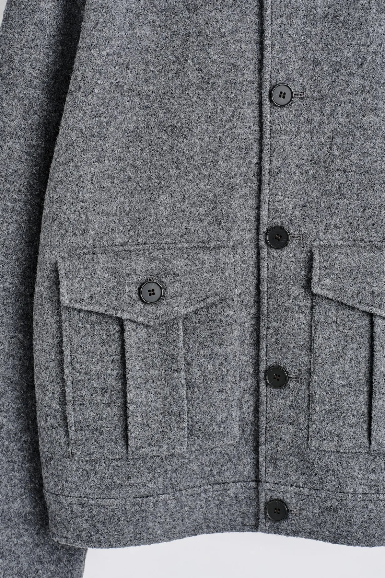 JACKE AUS GEKOCHTER WOLLE