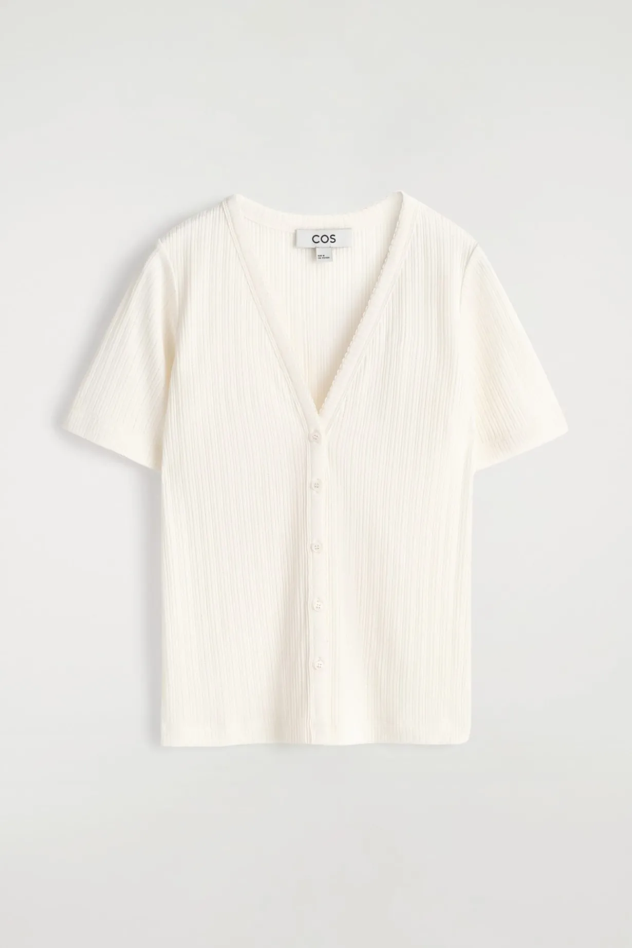 KURZÄRMLIGE STRICKJACKE AUS POINTELLE-STRICK