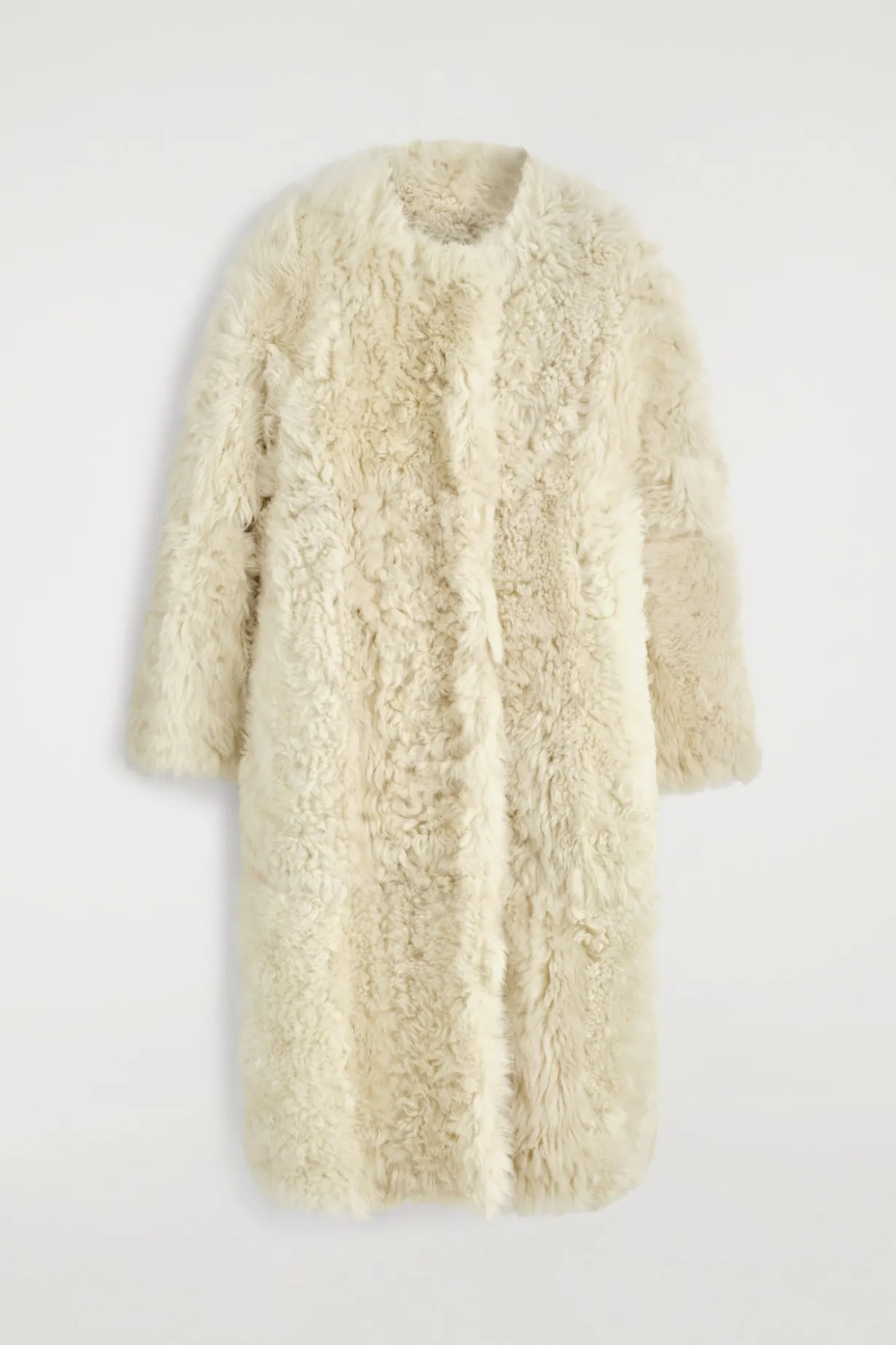 LANGER MANTEL AUS SHEARLING OHNE KRAGEN