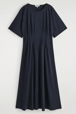 MIDIKLEID AUS BAUMWOLLE MIT BIESEN