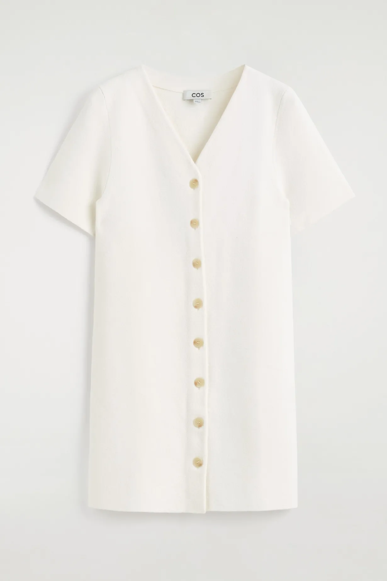MINIKLEID AUS FEINSTRICK MIT KNÖPFEN
