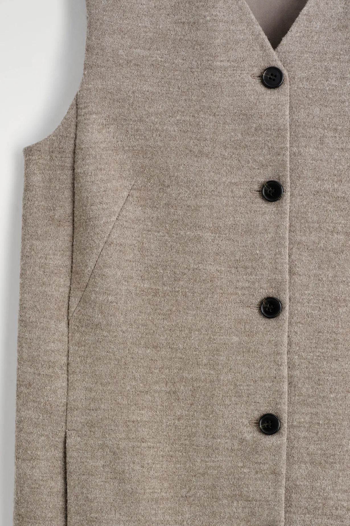 MINIKLEID AUS MERINOWOLLE MIT KNÖPFEN