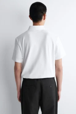 PIQUÉ-POLOSHIRT AUS TECHNISCHEM MATERIAL