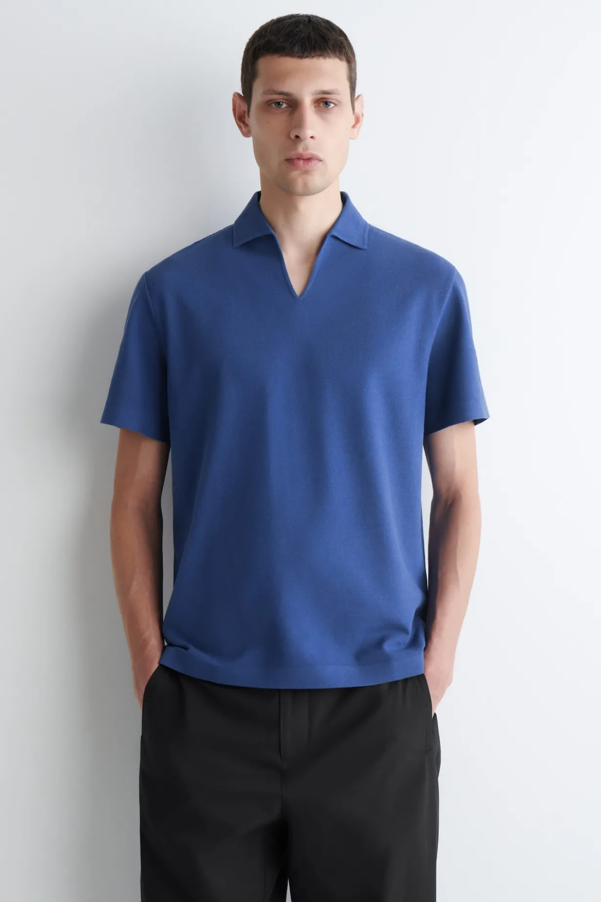 PIQUÉ-POLOSHIRT AUS TECHNISCHEM MATERIAL