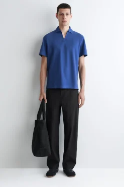 PIQUÉ-POLOSHIRT AUS TECHNISCHEM MATERIAL