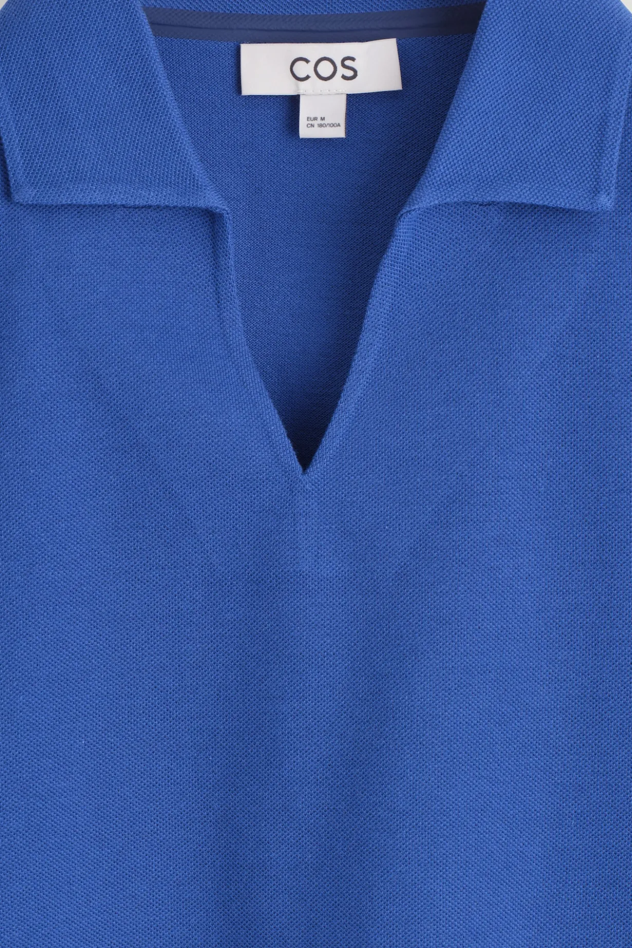 PIQUÉ-POLOSHIRT AUS TECHNISCHEM MATERIAL