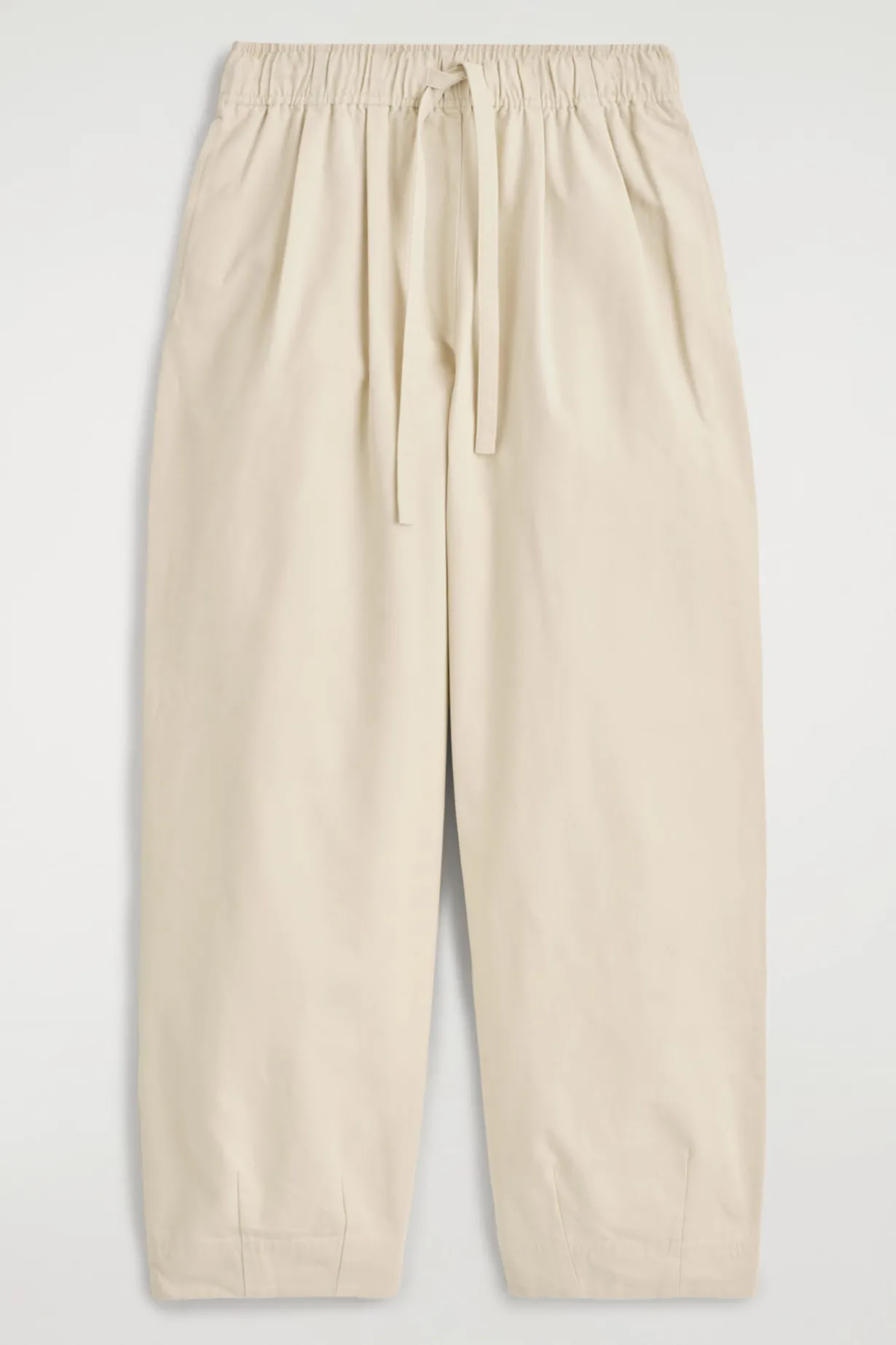 SCHMAL ZULAUFENDE BAUMWOLLHOSE MIT KORDELZUG