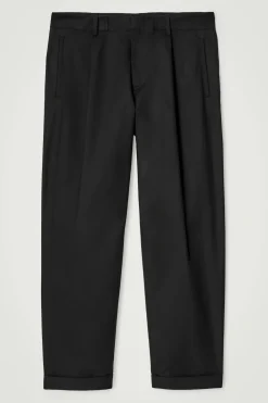 SCHMAL ZULAUFENDE HOSE AUS BAUMWOLLE MIT UMSCHLAG