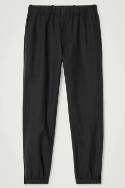 SCHMAL ZULAUFENDE HOSE MIT ELASTISCHEM BUND