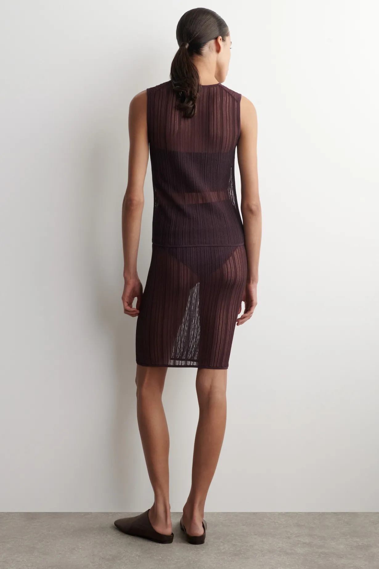 TRANSPARENTER STRICKROCK MIT SPITZENDETAILS