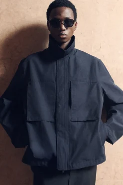 WINDJACKE MIT KAPUZE