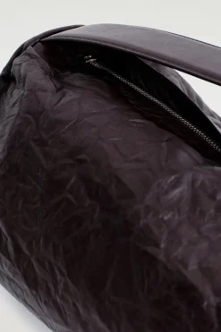 ZYLINDER-CLUTCH - STRUKTURIERTES LEDER